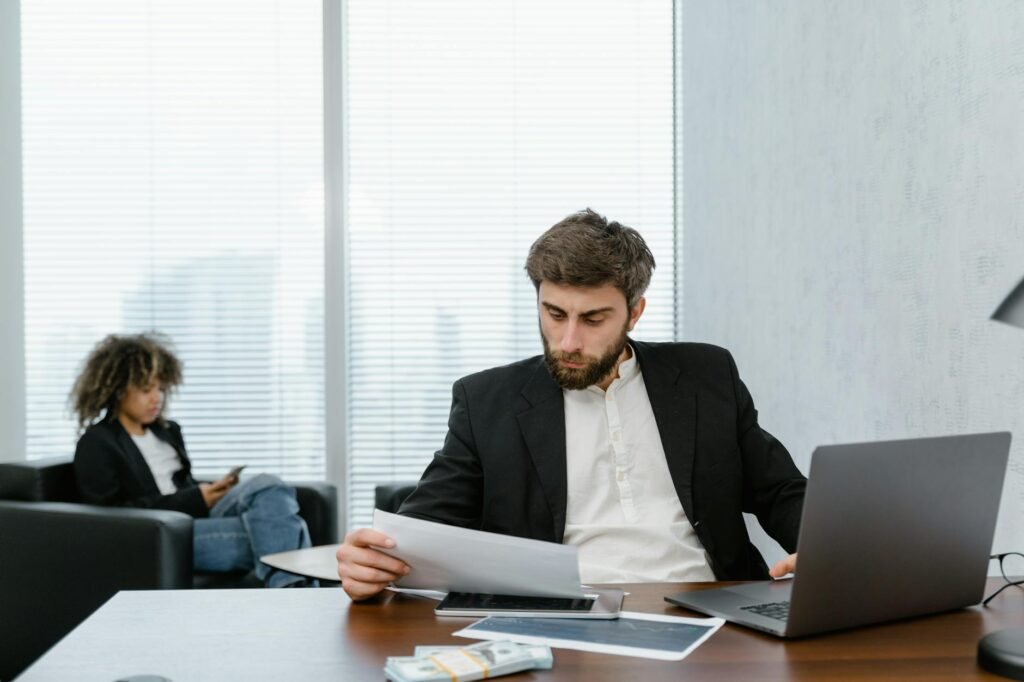 quantum risk assessments - Business professionals reviewing reports professional business image