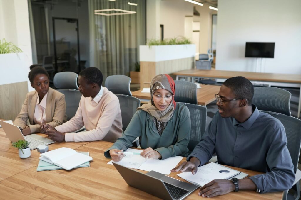 employee engagement trends - photorealistic modern workplace collaboration professional business image