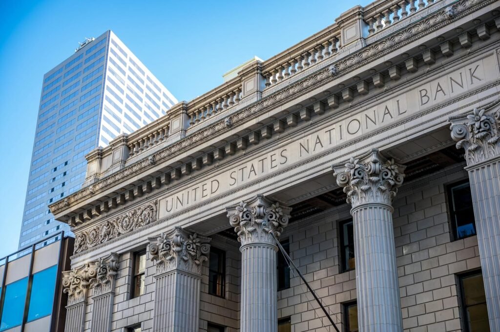 Portland bank merger - Portland bank executives merger professional business image