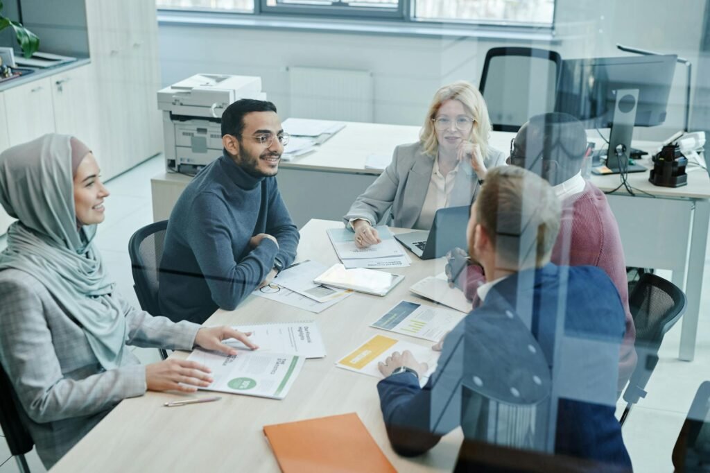 sales team growth - photorealistic sales team brainstorming professional business image