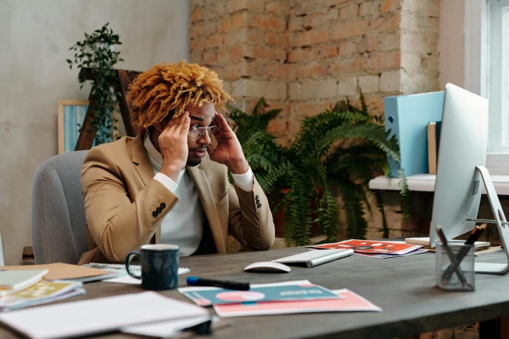 AI anxiety costs - AI anxiety stressed office professional business image