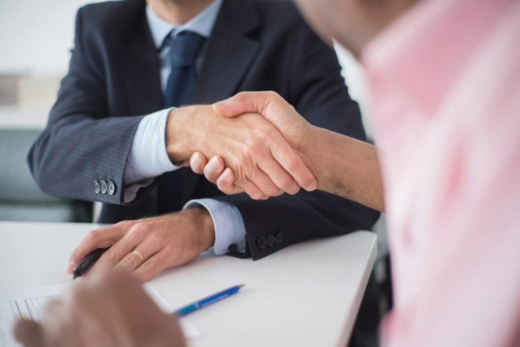 AI content licensing deal - AI deal negotiation business professional business image