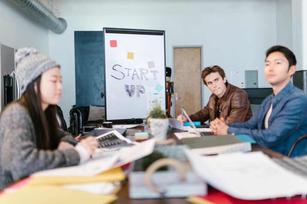AI enabling startups - AI-powered small startup team professional business image