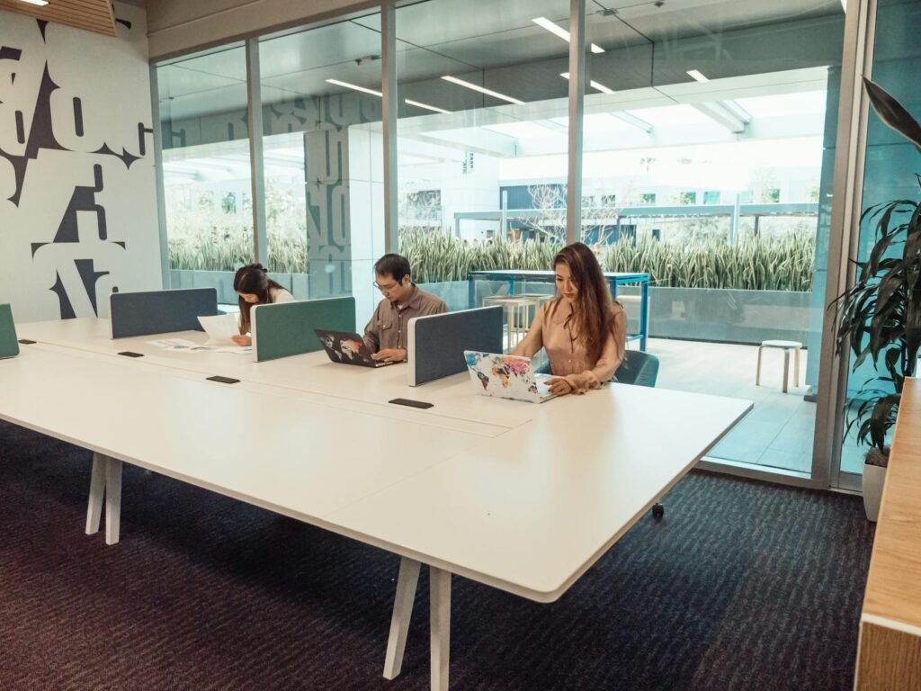 AI HR investment trends - AI-driven HR office collaboration professional business image