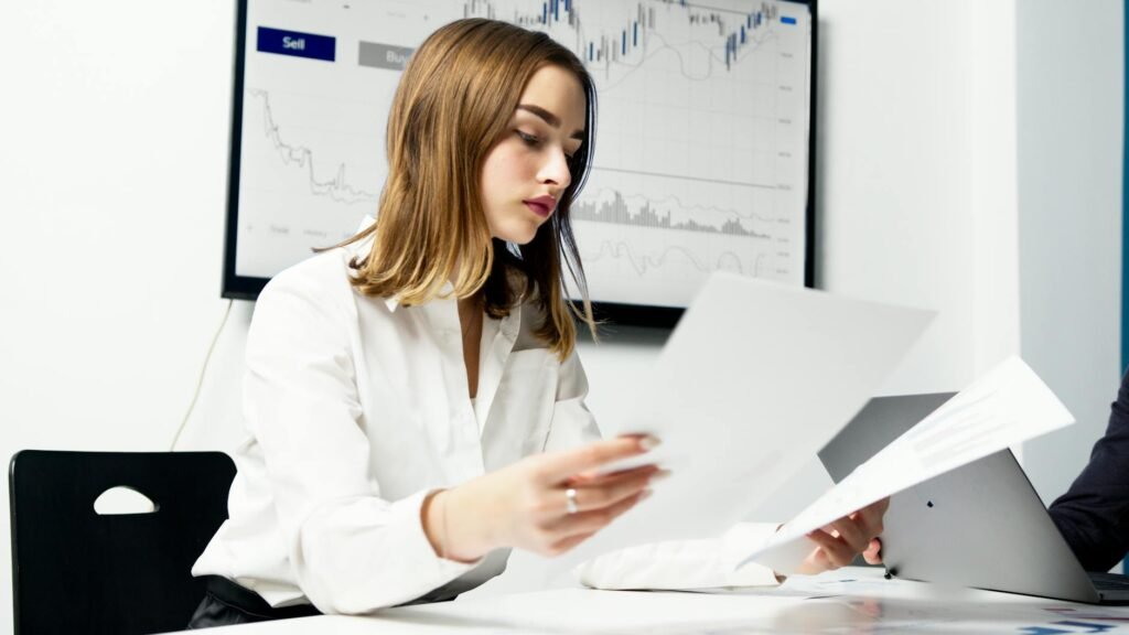 DNB stock news - finance professionals analyzing DNB professional business image