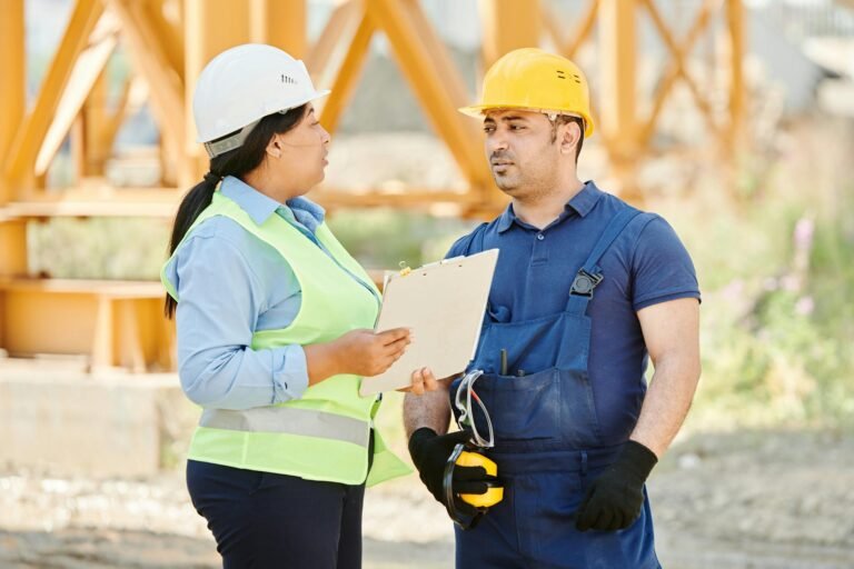 employee retention construction - construction site employee teamwork" professional business image