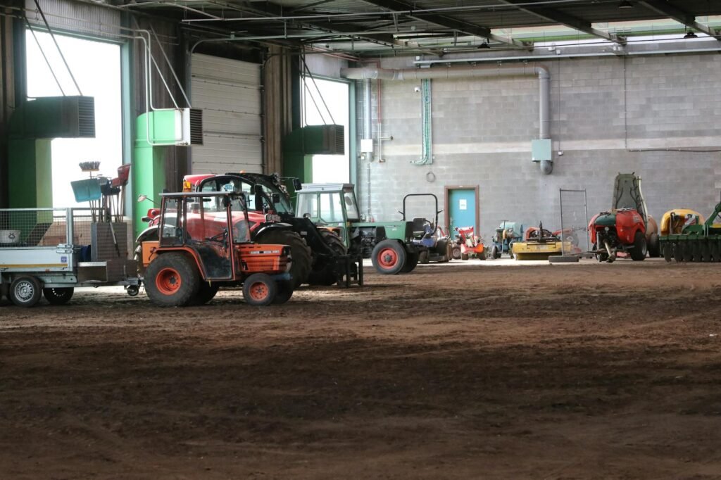 farm machinery market - industrial farm machinery workshop professional business image
