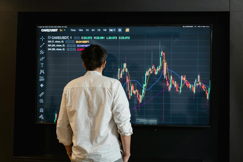 FIS Baird target downgrade - financial analyst reviewing stock professional business image
