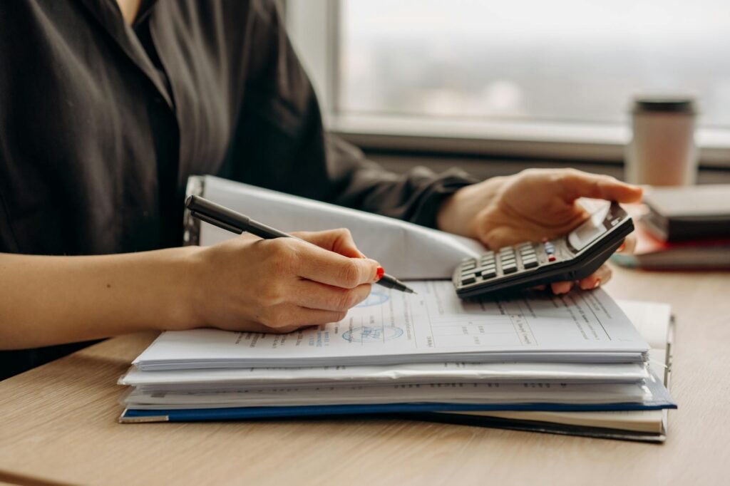 HMRC tax agent delay - HMRC office financial paperwork professional business image
