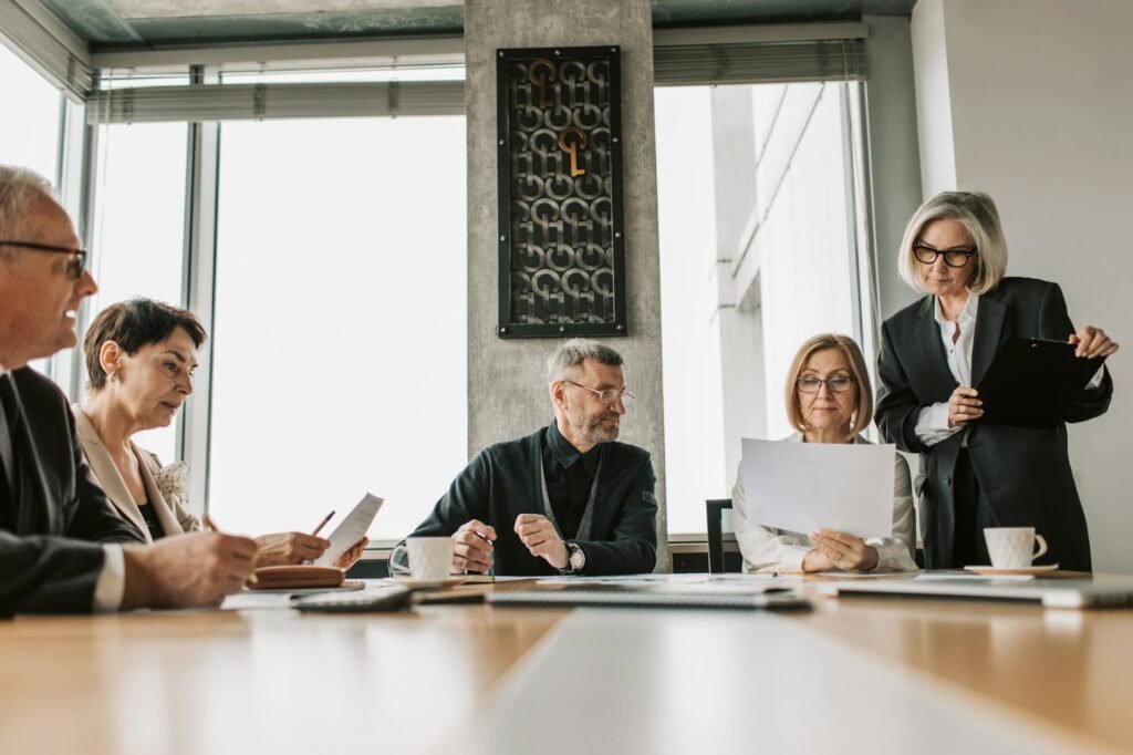 HR AI concerns - business executives discussing AI professional business image