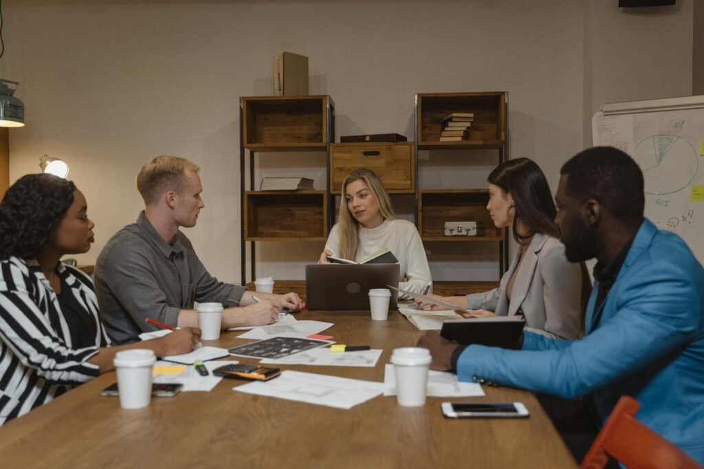leadership employee engagement - photorealistic office leadership team professional business image