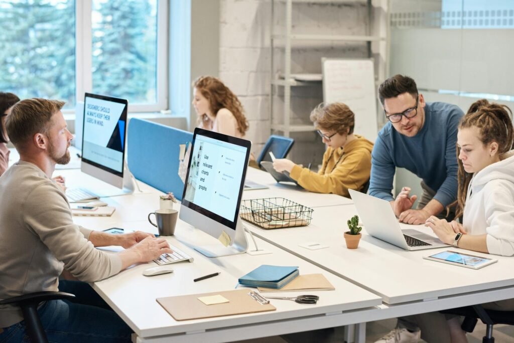 office design employee engagement - modern office employee collaboration professional business image