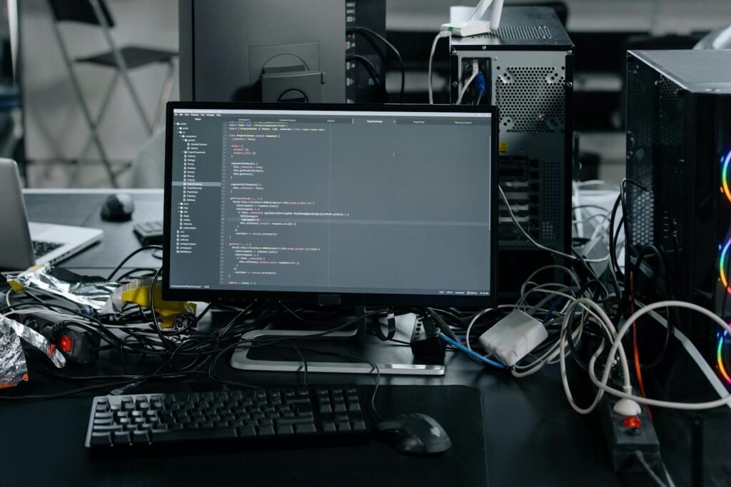 PE firm AI tech multiples - AI tech startup workspace professional business image