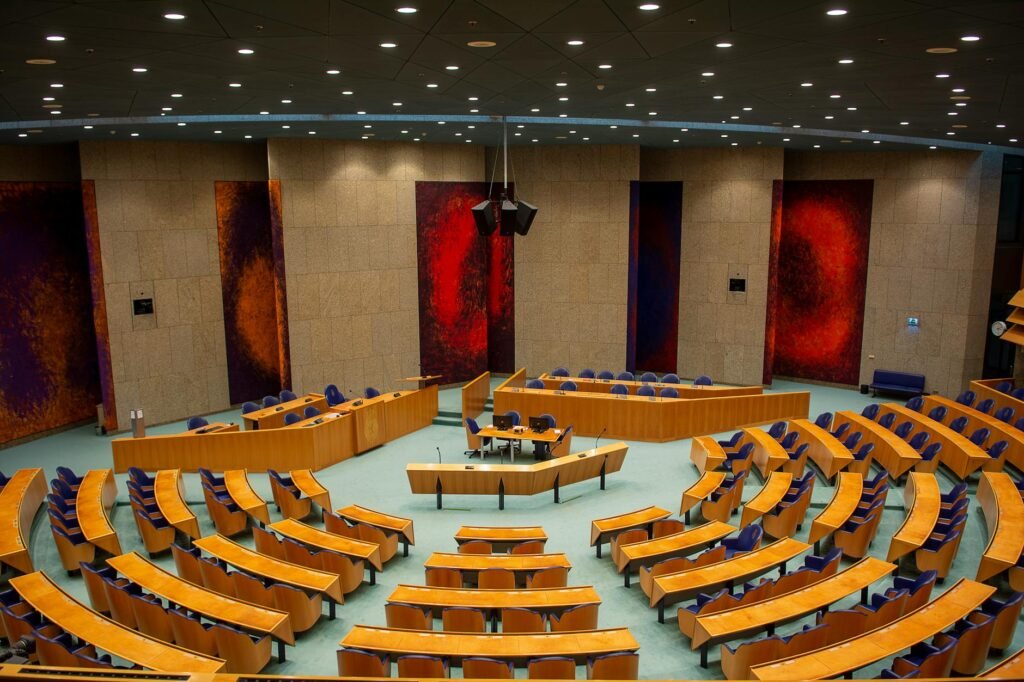 AI regulation debate - AI regulation lawmakers meeting professional business image