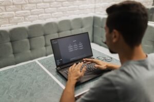 AI blog platforms - AI workspace with laptops professional business image