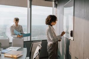 AI Investment Crowding - office workers analyzing AI professional business image