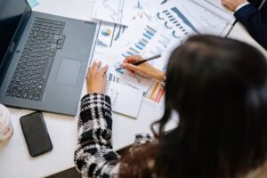 Determining What - workplace professionals analyzing data professional business image